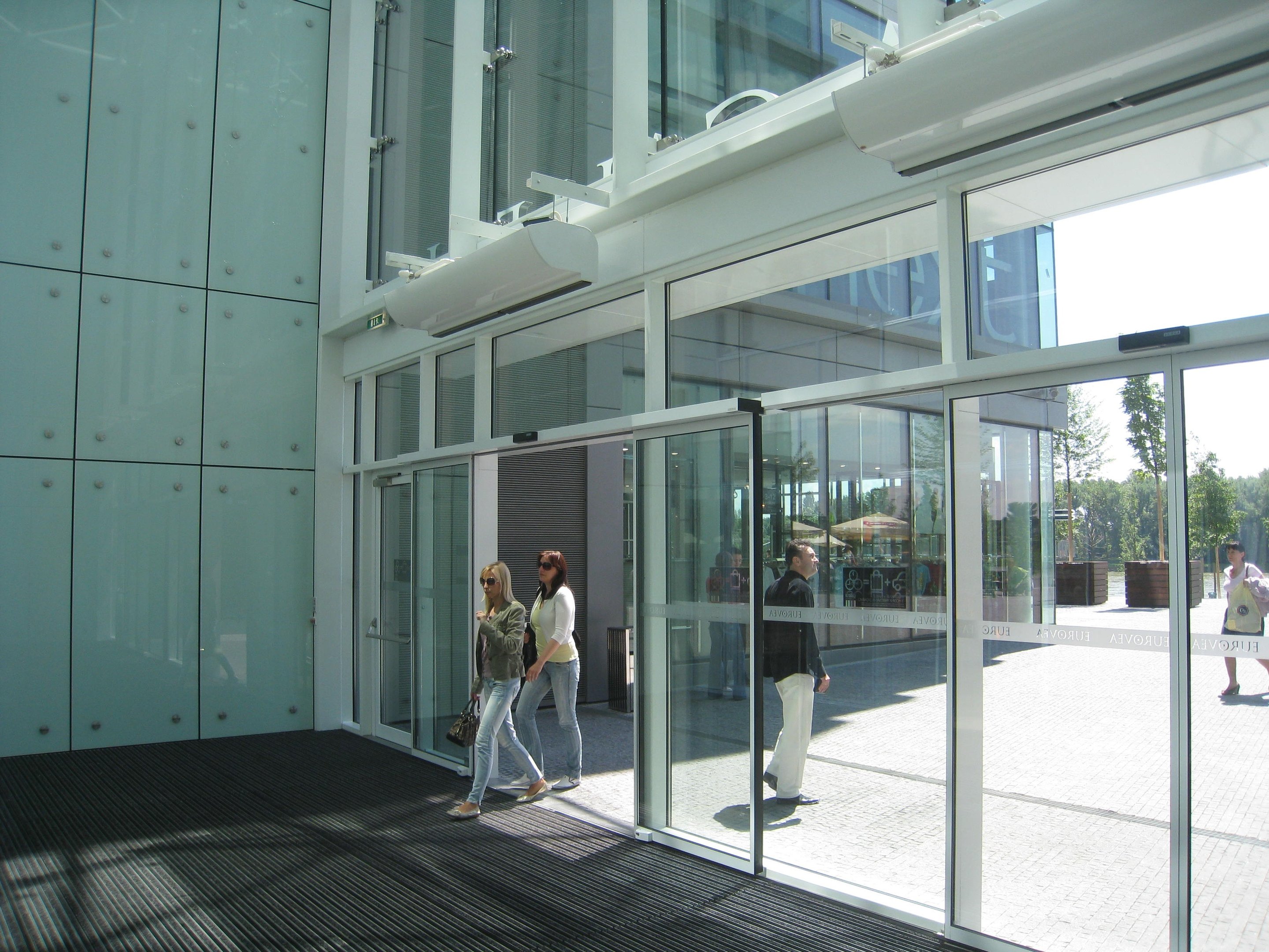 Commercial air curtain installed above entrance