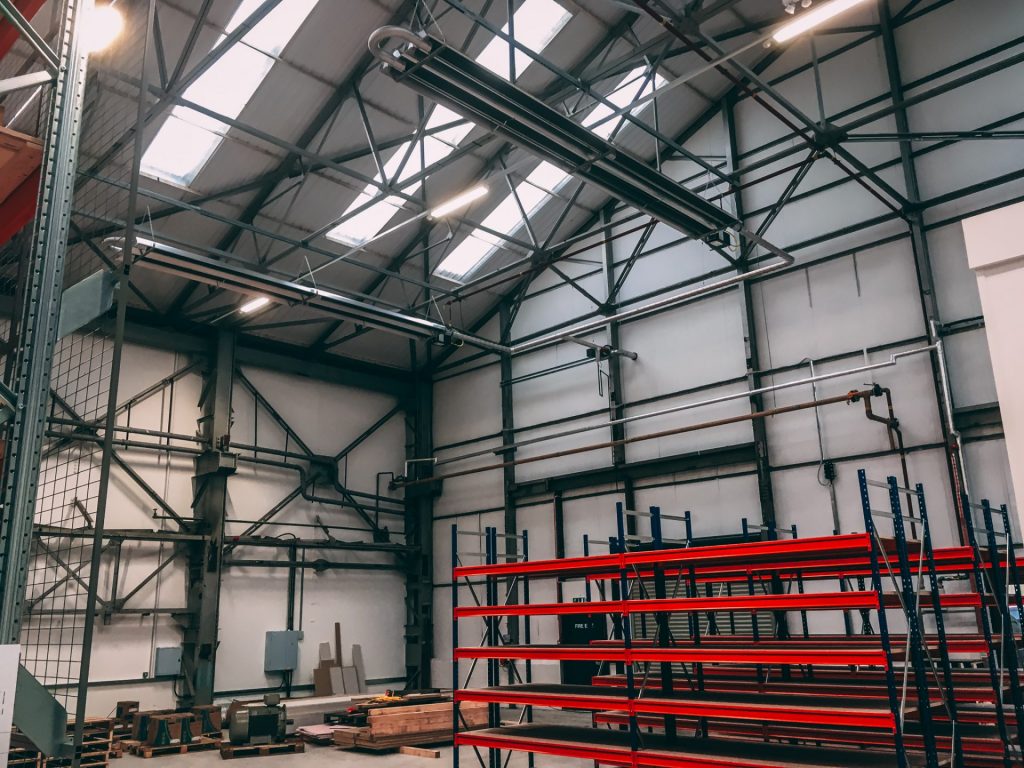 HVAC engineers installing a commercial heating system